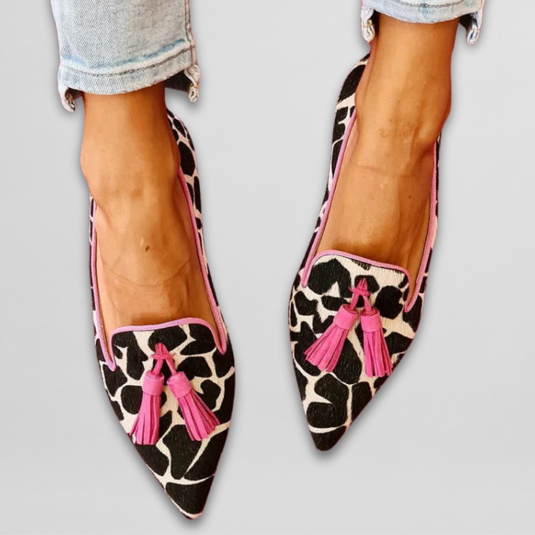 SIENNA | COW PRINT TASSEL LOAFERS