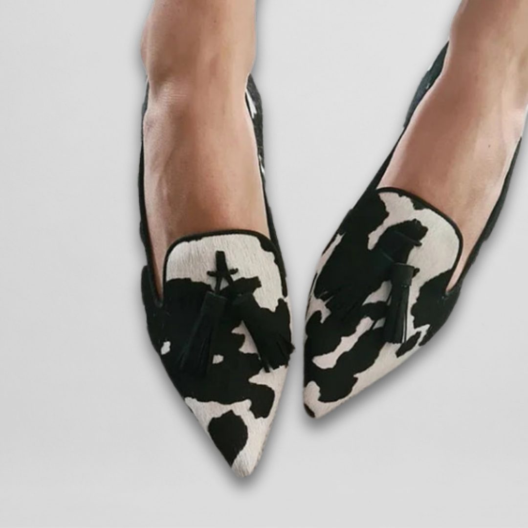 SIENNA | COW PRINT TASSEL LOAFERS