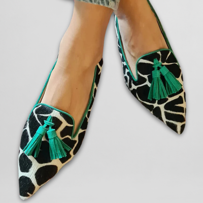 SIENNA | COW PRINT TASSEL LOAFERS